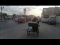 أم مريم وطفلتيها على دراجة مشروع توصيل الطلبات بالإسكندرية 