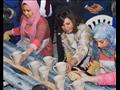وزيرة الهجرة تشارك فتيات قرية الفرستق في صناعة الخ