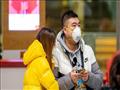 مواطنون يرتدون الكمامة خوفا من الاصابة بفيروس كورو