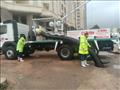 سيارة السيول تكسح مياه الأمطار بالإسكندرية
