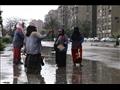 عمال النظافة في شوارع القاهرة لمواجهة الأمطار