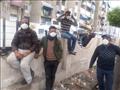 توزع كمامات على عمال النظافة في بورسعيد