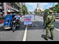الشرطة الفيليبينية عند مقطة تفتيش بين كويزون وماني