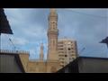 صورة لمأذنة المسجد الإبراهيمي بجانب المحال الجديدة