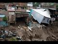 خراب في حي في سان سلفادور بسبب العاصفة اماندا في 3