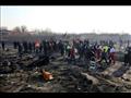   فرق الانقاذ تعمل في موقع تحطم الطائرة الاوكرانية