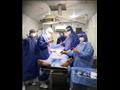 فريق طبي ينقذ مريض كورونا في مستشفى قنا العام