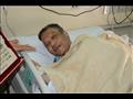 محمد شرف خلال تواجده في المستشفى