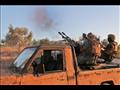 عناصر من هيئة تحرير الشام على متن شاحنة في إدلب بت