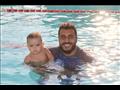 محمد الزغوي مدرب الرضع على السباحة