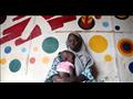  امرأة مريضة جاسلة مع طفلها في مستشفى أنكا حيث تقد