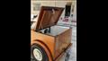 شاب أسيوطي يصنع سيارة خشبية بسرعة 160 