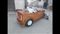 شاب أسيوطي يصنع سيارة خشبية بسرعة 160 