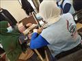 صور.. فحص 1400 مواطن خلال قافلة طبية مجانية في بني سويف