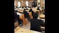 طلاب إعلام بني سويف يتشحون بالسواد داخل لجان الامتحانات 