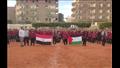 رفع العلم الفلسطيني داخل فناء مدارس أسيوط