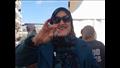 مواطنون يلتقطون الصور التذكارية عقب التصويت في بورسعيد