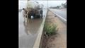 أحياء الإسكندرية تزيل آثار الأمطار (7)