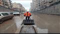 عمال شركة الصرف الصحي بالإسكندرية خلال الأمطار 