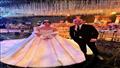 حضره النجوم.. علي الشرنوبي يتألق بتصميم فستاني زوجة حسن شاكوش بزفافها (صور) 