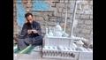 شاب يُبدع في تصميم مجسمات الطائرات والمساجد بسوهاج