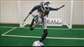 بالصور.. أول روبوت يلعب كرة القدم وأحرف من ميسي