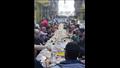  أهالي فيصل يجتمعون على مائدة إفطار كبيرة بشوارع المنطقة