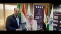  محمود فاضل مدير التحرير بمؤسسة أونا مع الدكتورة ح