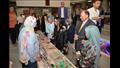 محافظ أسيوط ورئيس المجلس القومي للمرأة داخل معرض المنتجات اليدوية