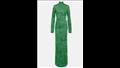 وتألقت أمينة مرتدية فستانا طويلا باللون الأخضر، تميز بأنه مزينًا بالوورد