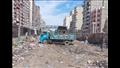 رفع أكوام القمامة من مسار مترو الإسكندرية (8)