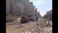 رفع أكوام القمامة من مسار مترو الإسكندرية (10)