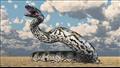 تصور فني لتيتانوبوا أكبر ثعبان موجود على وجه الأرض على الإطلاق