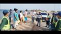 حملات النظافة بشاطئ البلوهول بمدينة دهب بمشاركة السائحين والمواطنين (15)
