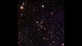 أكثر من 50 ألف مجرة في عنقود  Abell 2390 الذي يبعد 2.7 مليار سنة ضوئية