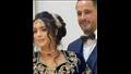 عريس يفاجئ عروسته بهدية غير تقليدية في حفل زفافهما (فيديو)