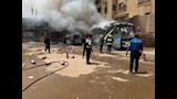 تفحم أتوبيس وسيارة أمام مدرسة خاصة بحدائق الأهرام