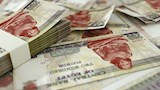 البنك الأهلي يخفض سعر الفائدة 1% على الشهادات الثل