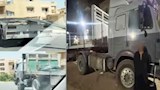 سائق نقل يحمّل أسياخ حديد بارزة