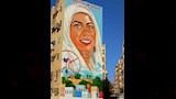 فنانان يعيدان رسم هوية المدينة على جدرانها