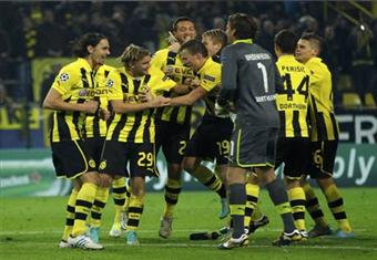 تأهل دورتموند وأرسنال إلى دور الـ16 الأوروبي وخروج مشرف لنابولي 