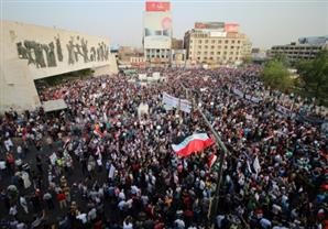 الأمن العراقي يبدأ في تفريق مظاهرات بغداد بالقوة