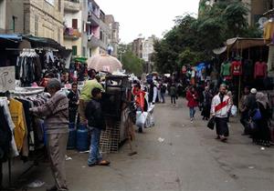 "وكالة البلح".. ملاذُ البسطاء لشراء الملابس الشتوية