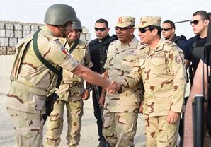 17 صورة ترصد عودة السيسي للزي العسكري (فيديو)