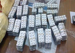 ضبط ألف قرص مخدر وهارب وأسلحة نارية بالجيزة