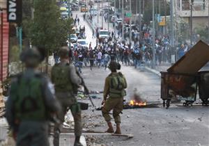 نقابيون فلسطينيون يتظاهرون في غزة للتحذير من توقف عمليات إعادة الإعمار 
