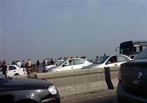 مصرع 4 أشخاص وإصابة 11 إثر انقلاب سيارتين من أعلى محور 26 يوليو