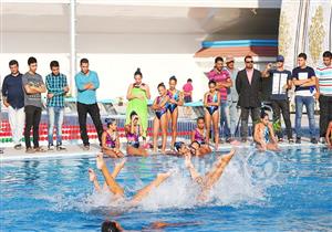 بالصور- عروض باليه مائية وذبح "عجل" في افتتاح حمام جامعة القاهرة الأوليمبي 