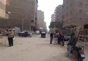 فريق من النيابة يُعاين مكان الهجوم على محل لبيع الخمور بالعمرانية