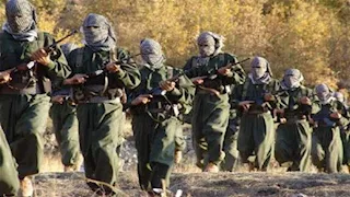 مسلحو "حزب العمال" يحرقون أسلحتهم شمال العراق.. وأردوغان يعلن "الانتصار"